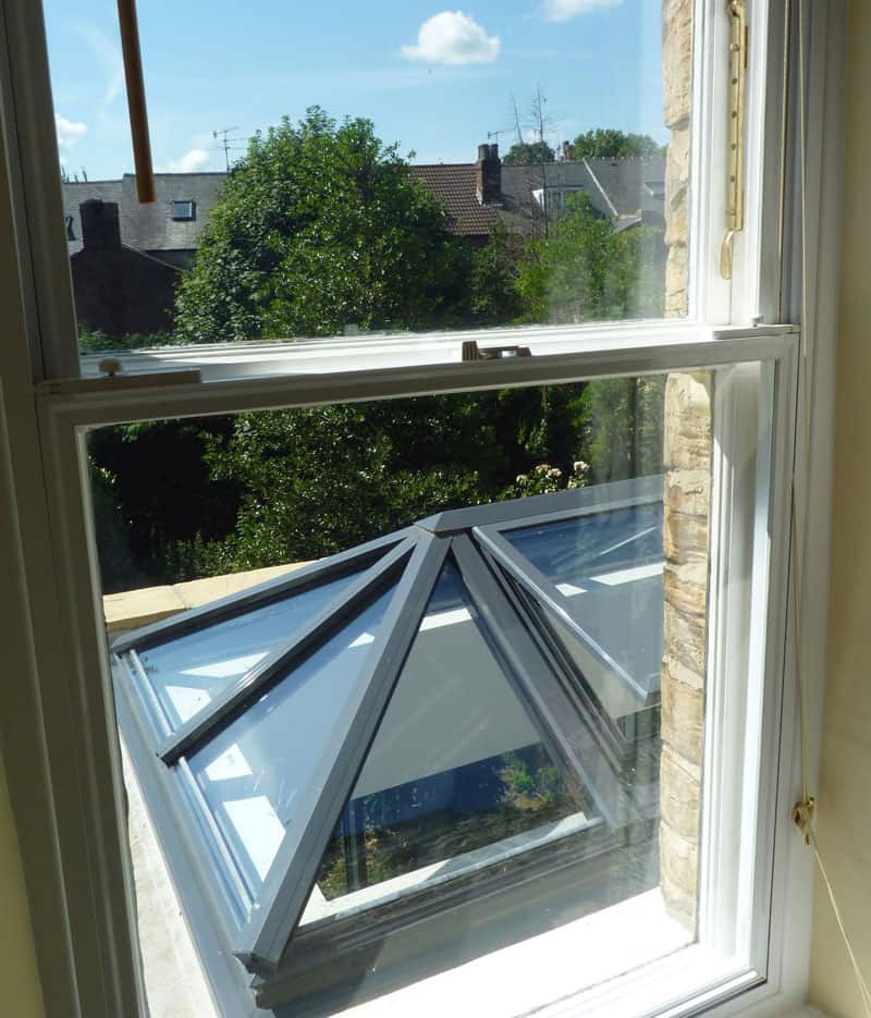 The secondary glazed units sit over the existing primary window frame