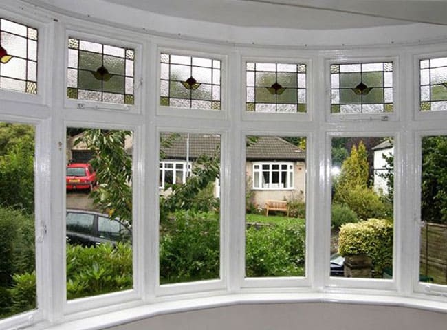 Post secondary glazing installation, this curved bay window is warmer, quieter and drie