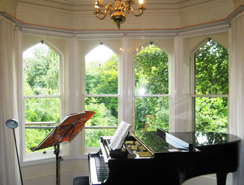 Secondary glazing can really help acoustics.